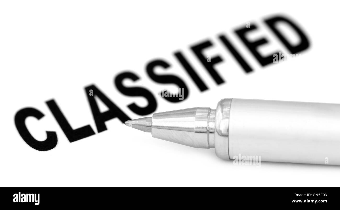Classified printed in paper with a silver ballpoint Stock Photo
