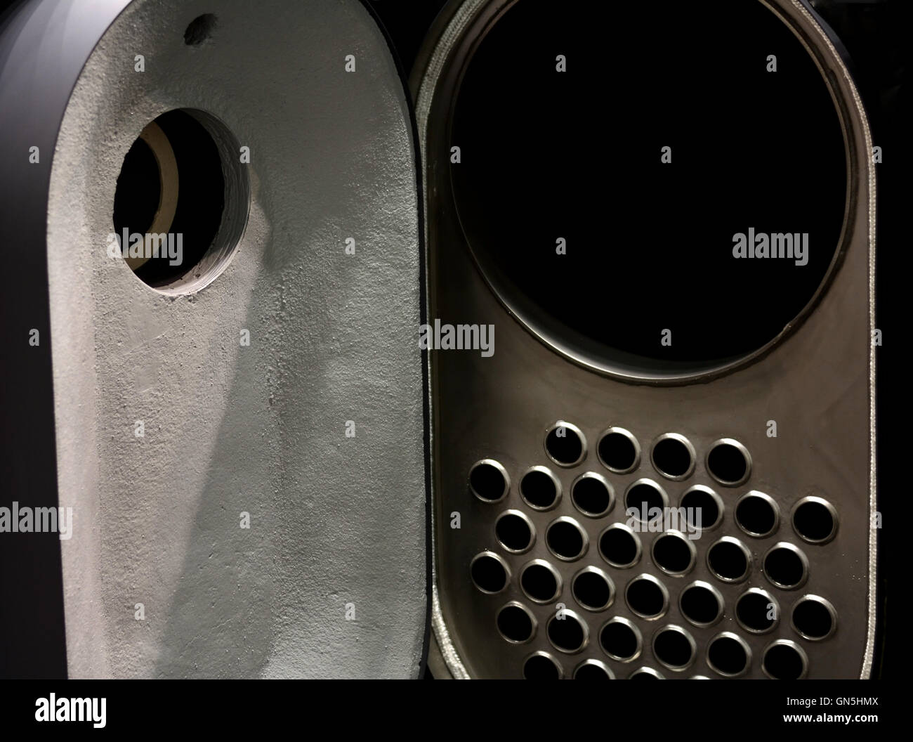 Industrial boiler with door opened shows the furnace and heat exchanger system used in plumbing and heating for large consumers. Stock Photo