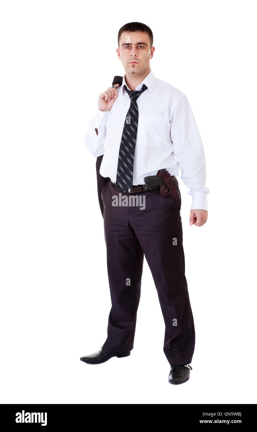young man in black suit with gun Stock Photo