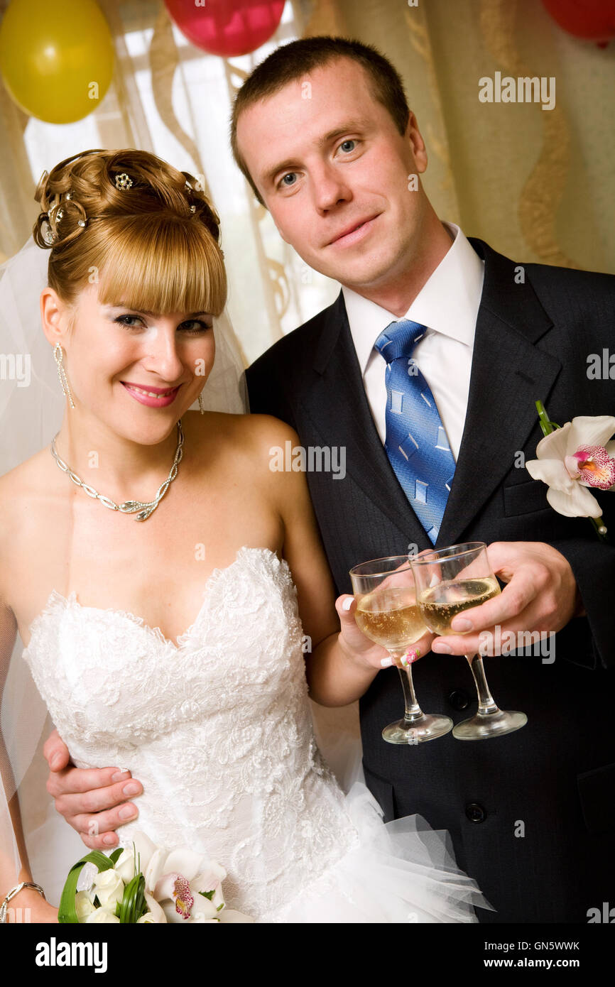 bride and groom with champagne Stock Photo Alamy