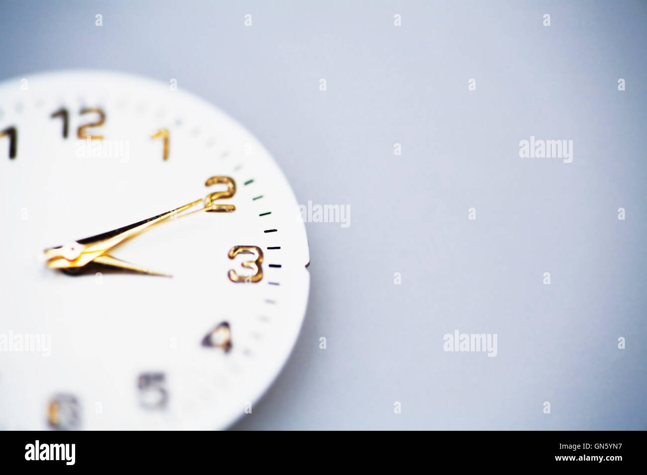 Hands on an old clock Stock Photo Alamy