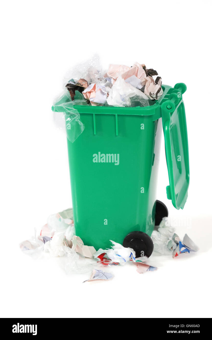 overflowing garbage bin Stock Photo