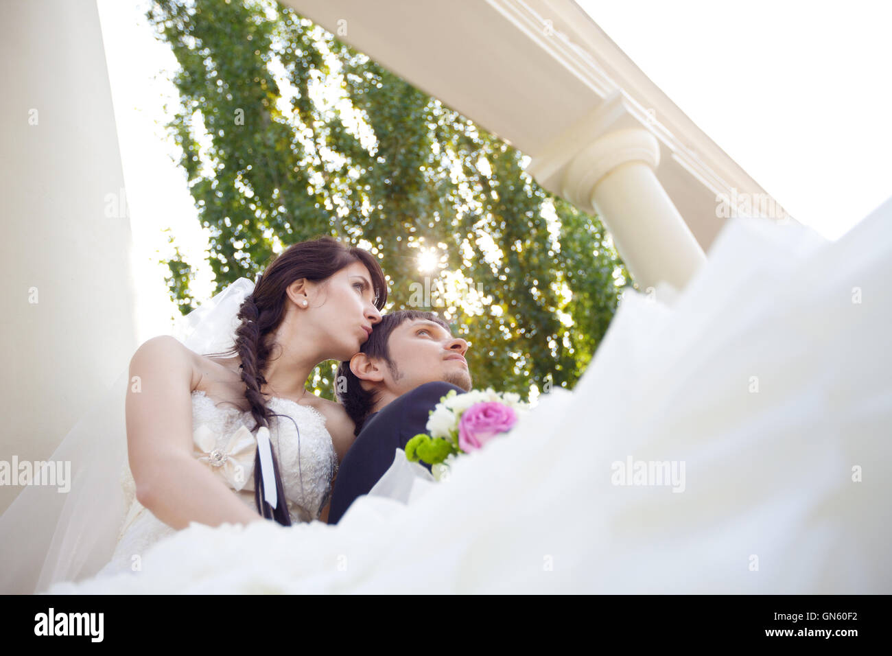 couple in columns Stock Photo - Alamy