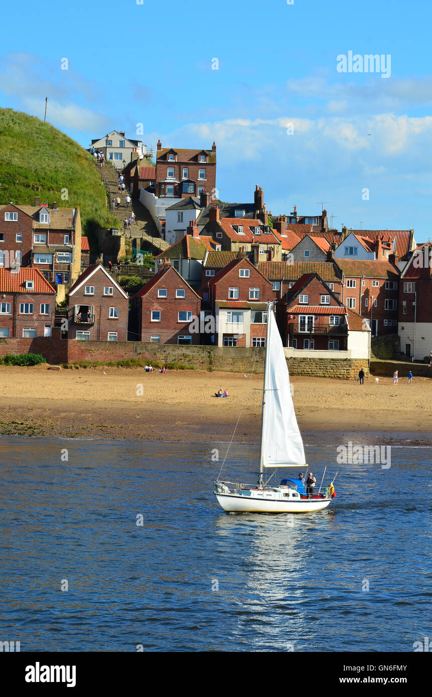 Boat leaving Whitby harbour North Yorkshire England UK Stock Photo - Alamy