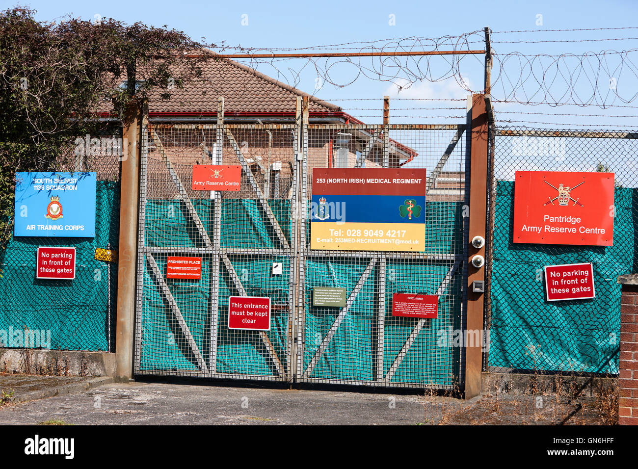 Warning And Information Signs On Rear Entrance To British Army Reserve Centre In South Belfast