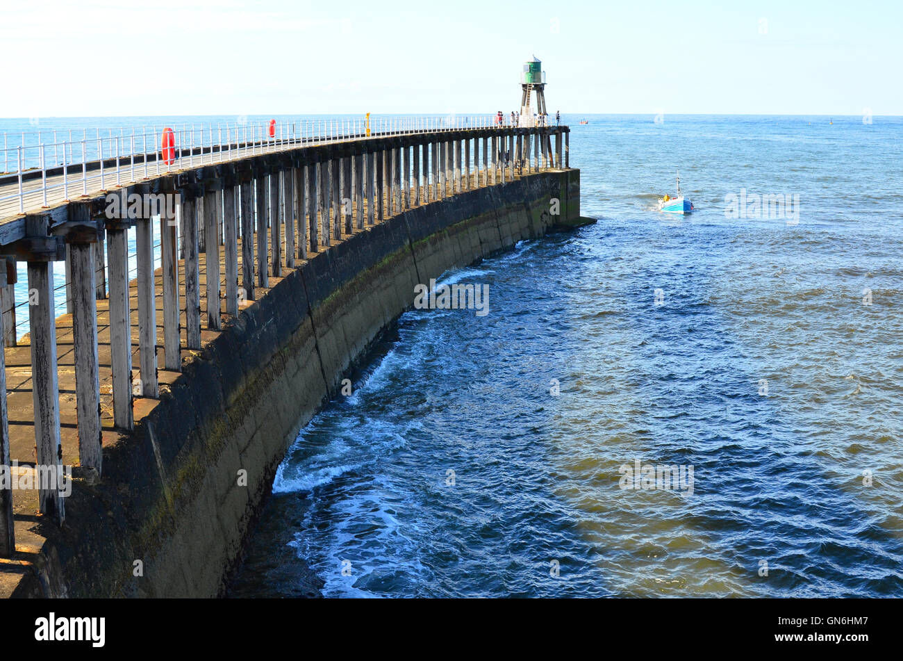 Boat entering Whitby harbour North Yorkshire England UK Stock Photo - Alamy