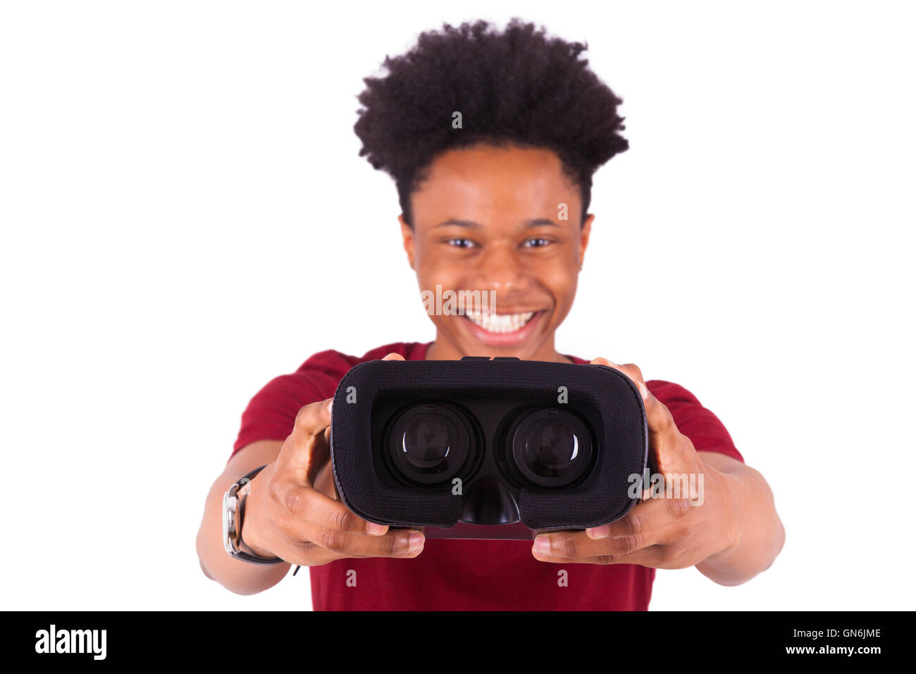 African American young man giving a vr virtual reality headset over ...