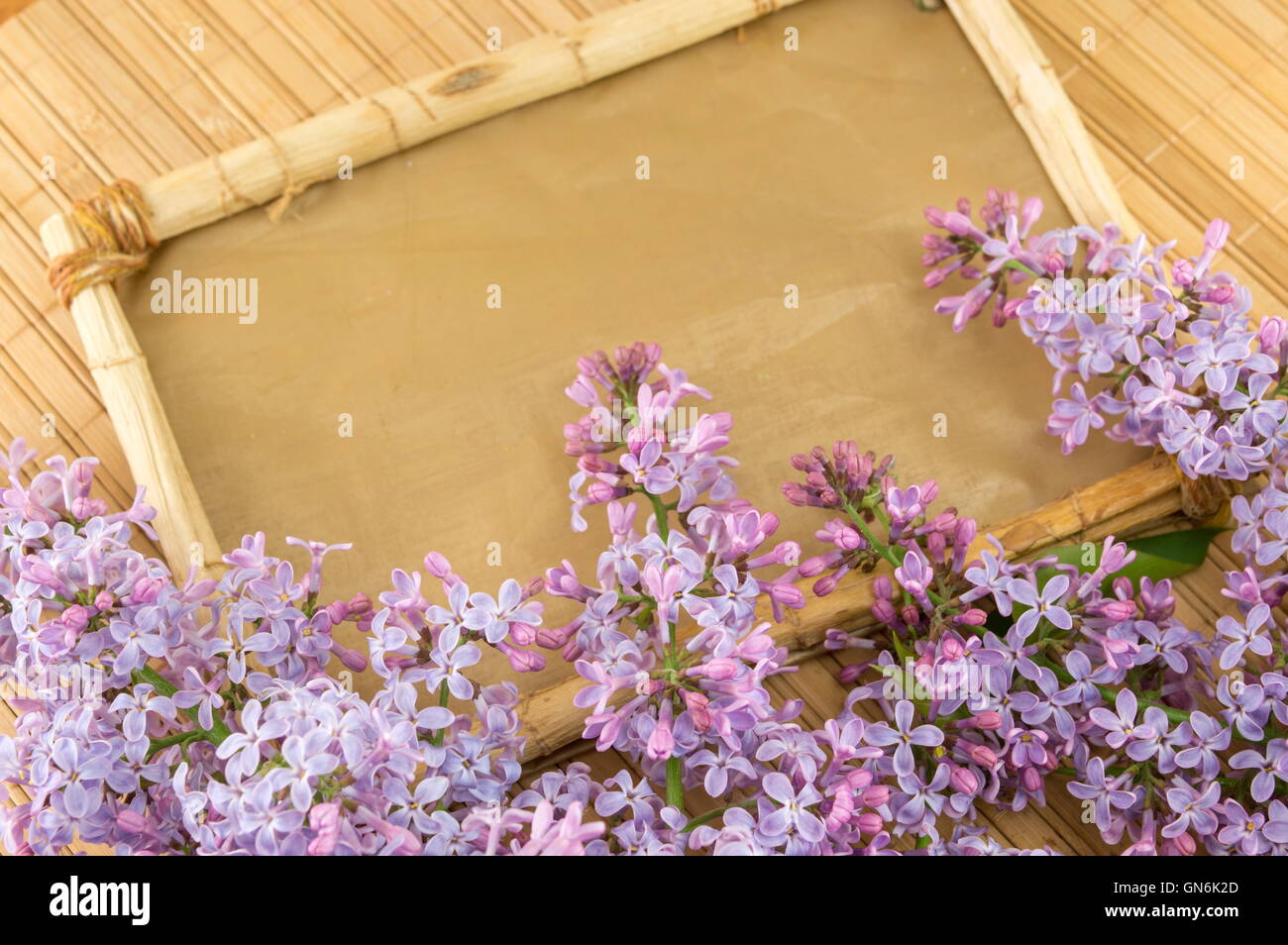 lilac flower and old wooden frame Stock Photo
