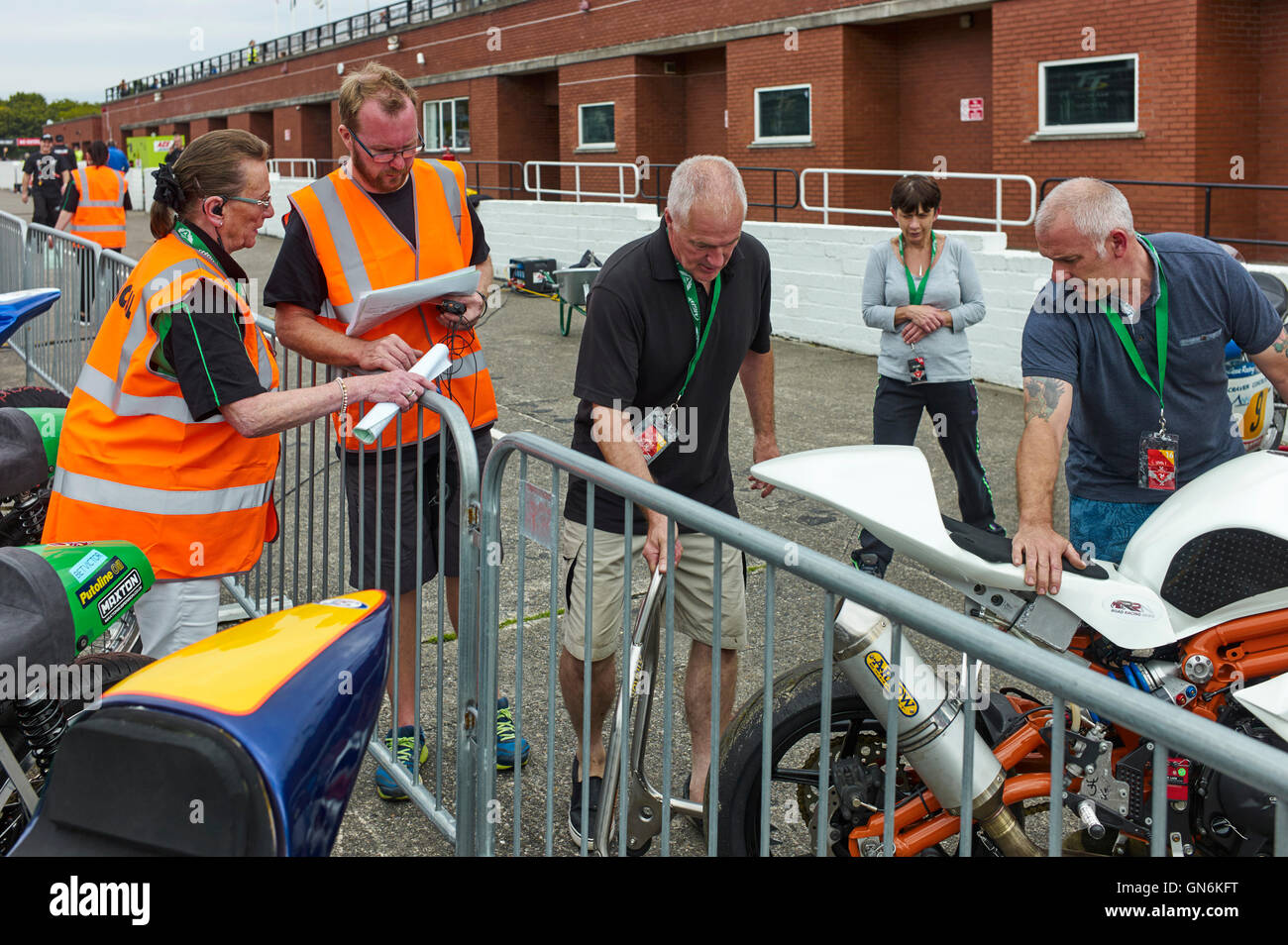 Postioning bikes prior at the start of practices to  Manx Festival of Motorcycling 2016 Stock Photo