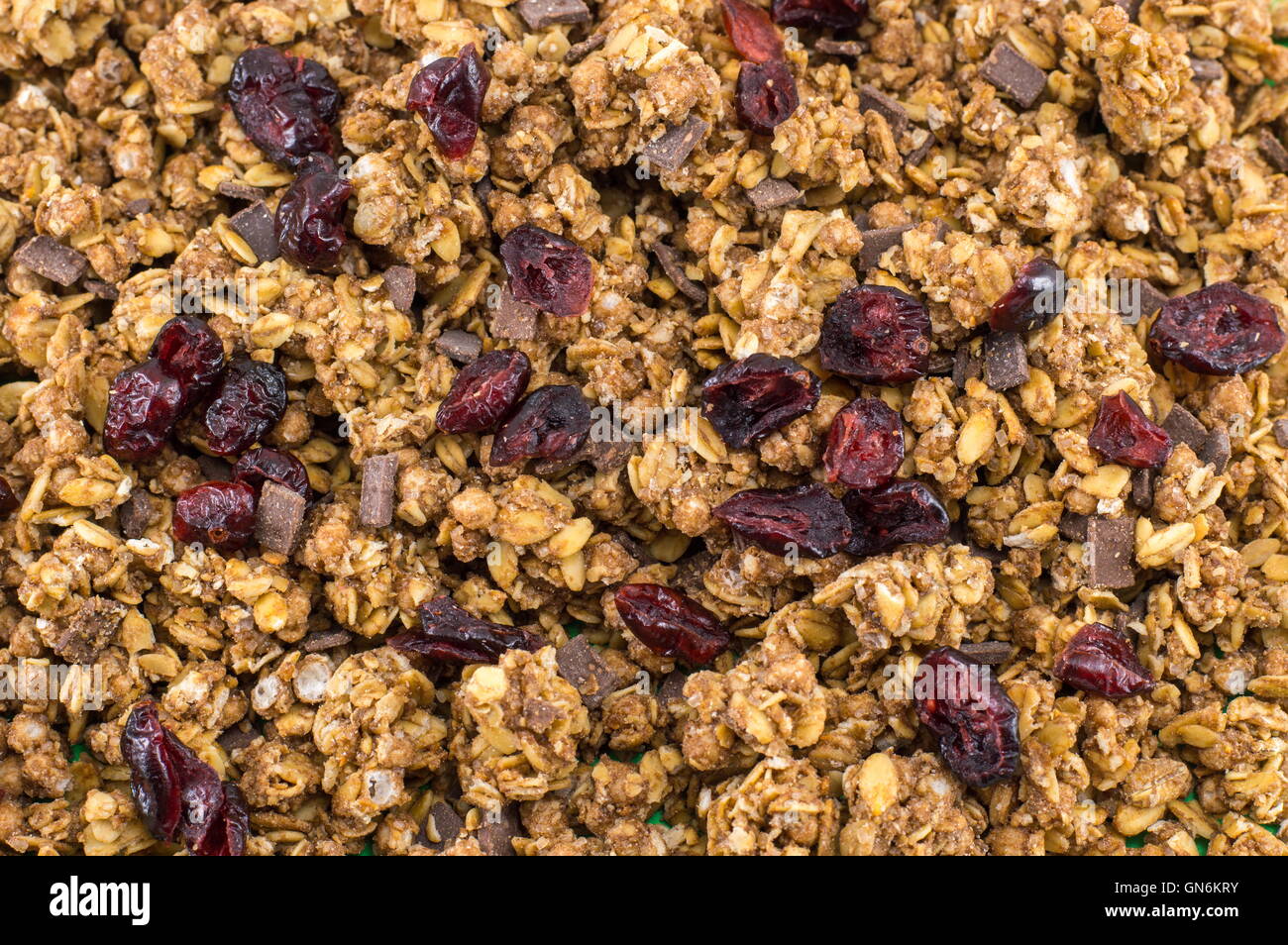 Healthy granola muesli cereals with dried fruit background Stock Photo