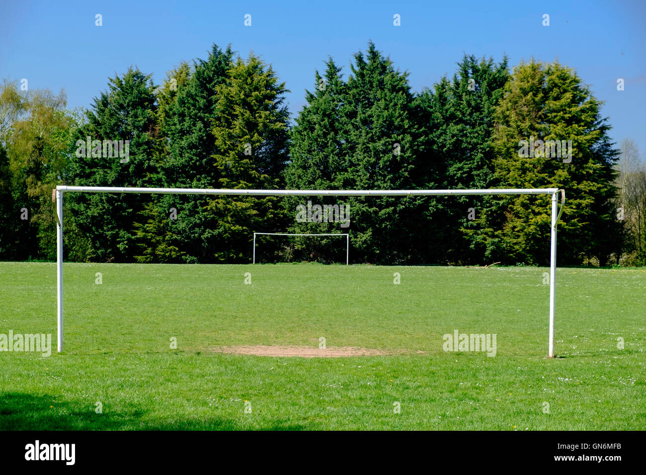Recreation ground with football goalposts. Stock Photo