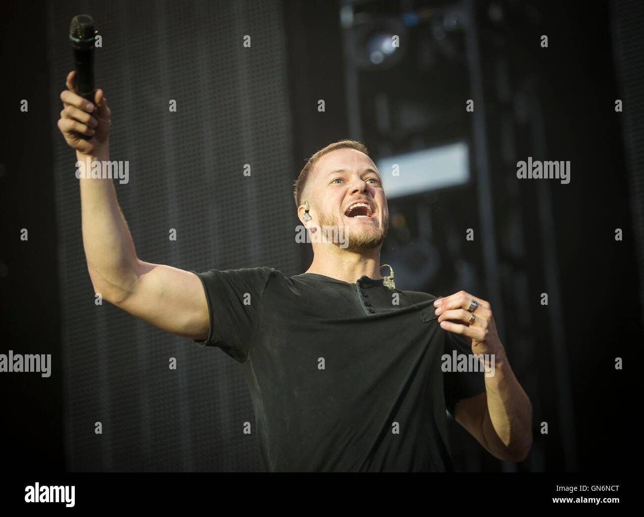 Imagine Dragons lead singer lead Dan Reynolds performs during the Leeds Festival at Bramham Park, West Yorkshire. Stock Photo