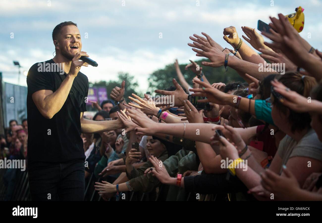 Imagine Dragons lead singer lead Dan Reynolds performs during the Leeds Festival at Bramham Park, West Yorkshire. Stock Photo