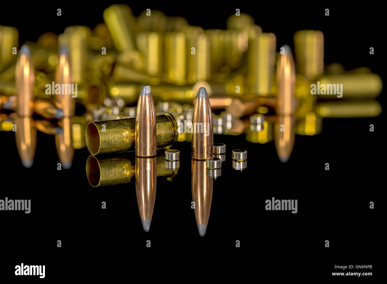 Brass and copper bullet ammunition with reflection Stock Photo Alamy