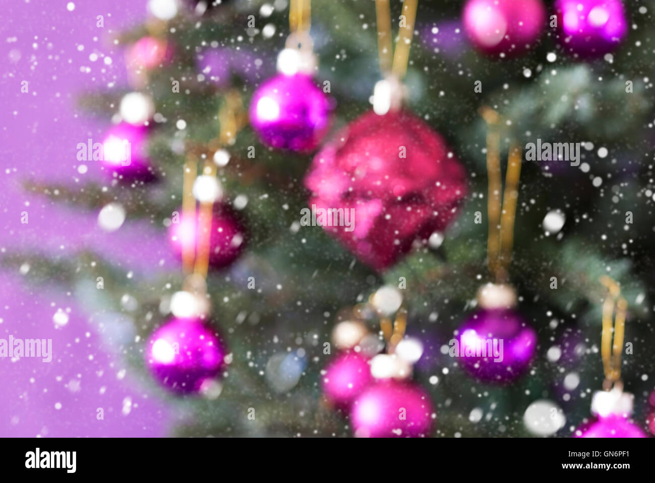 Blurry Christmas Tree With Rose Quartz Balls And Snowflakes Stock Photo