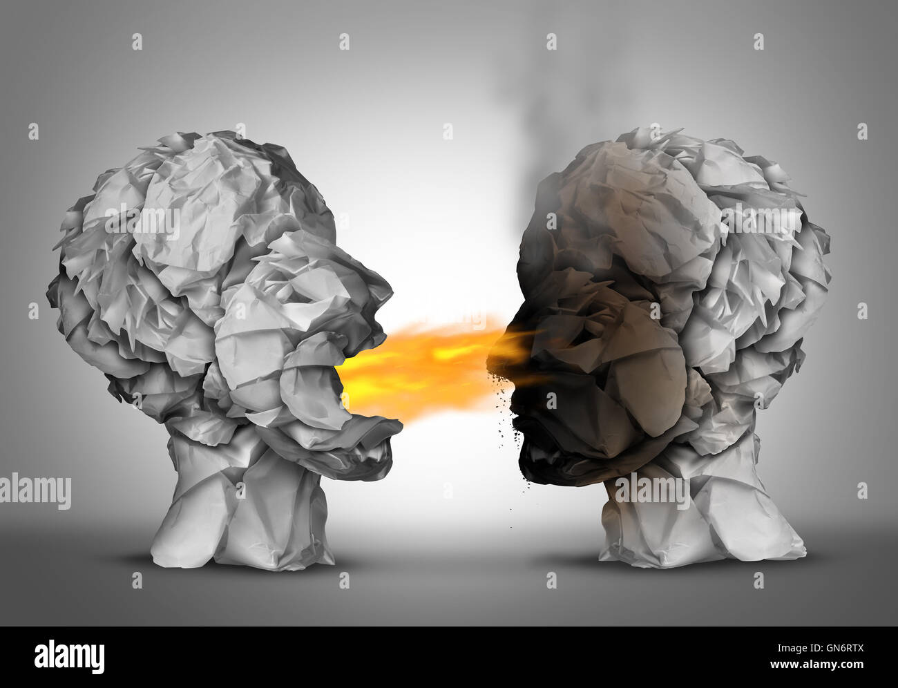 Debate winner and incendiary inflammatory language or winning an argument or debating ideas as a group of crumpled paper shaped Stock Photo