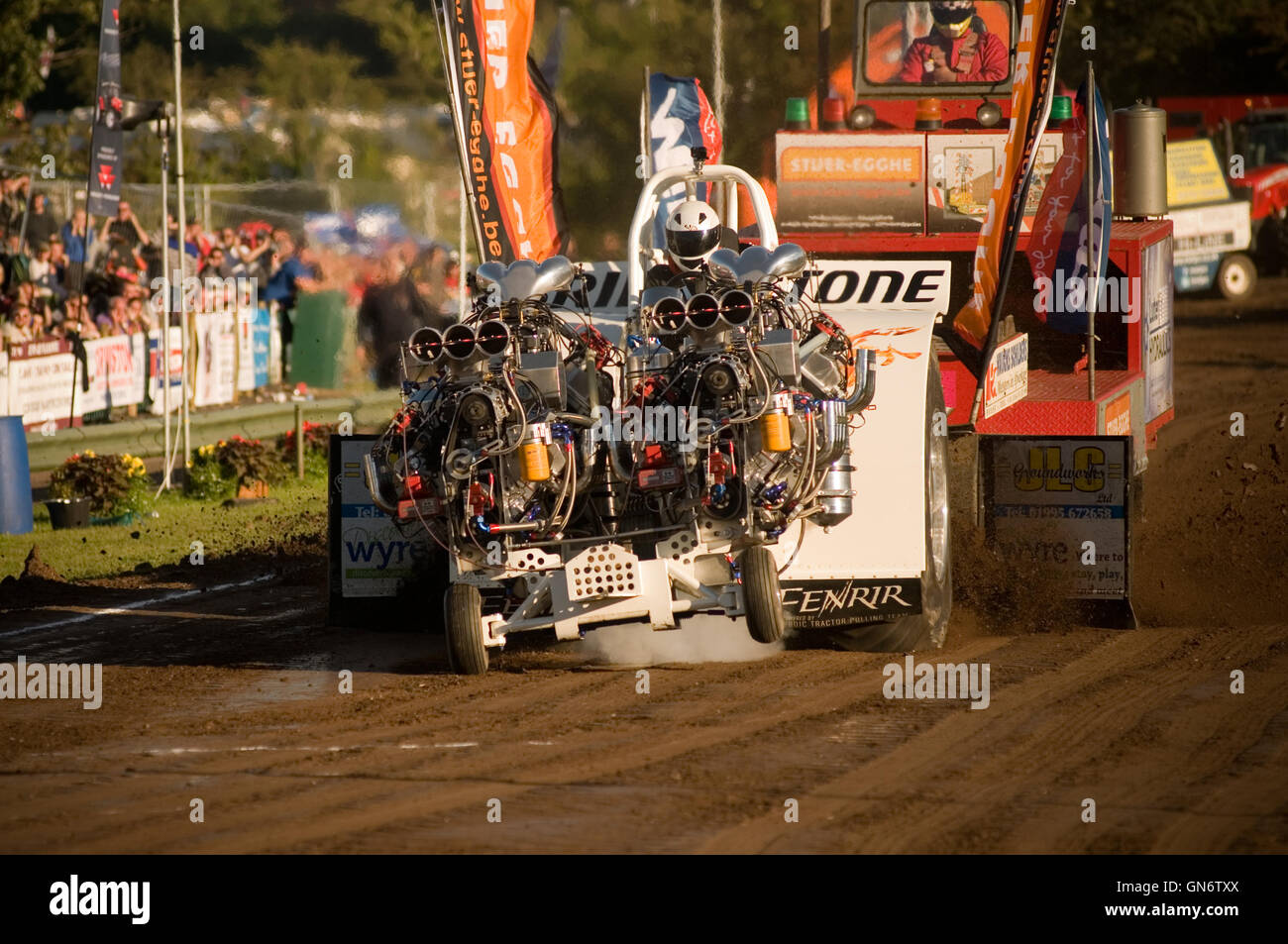danish tractor pulling team competing with 4 V8 supercharged engines Stock Photo
