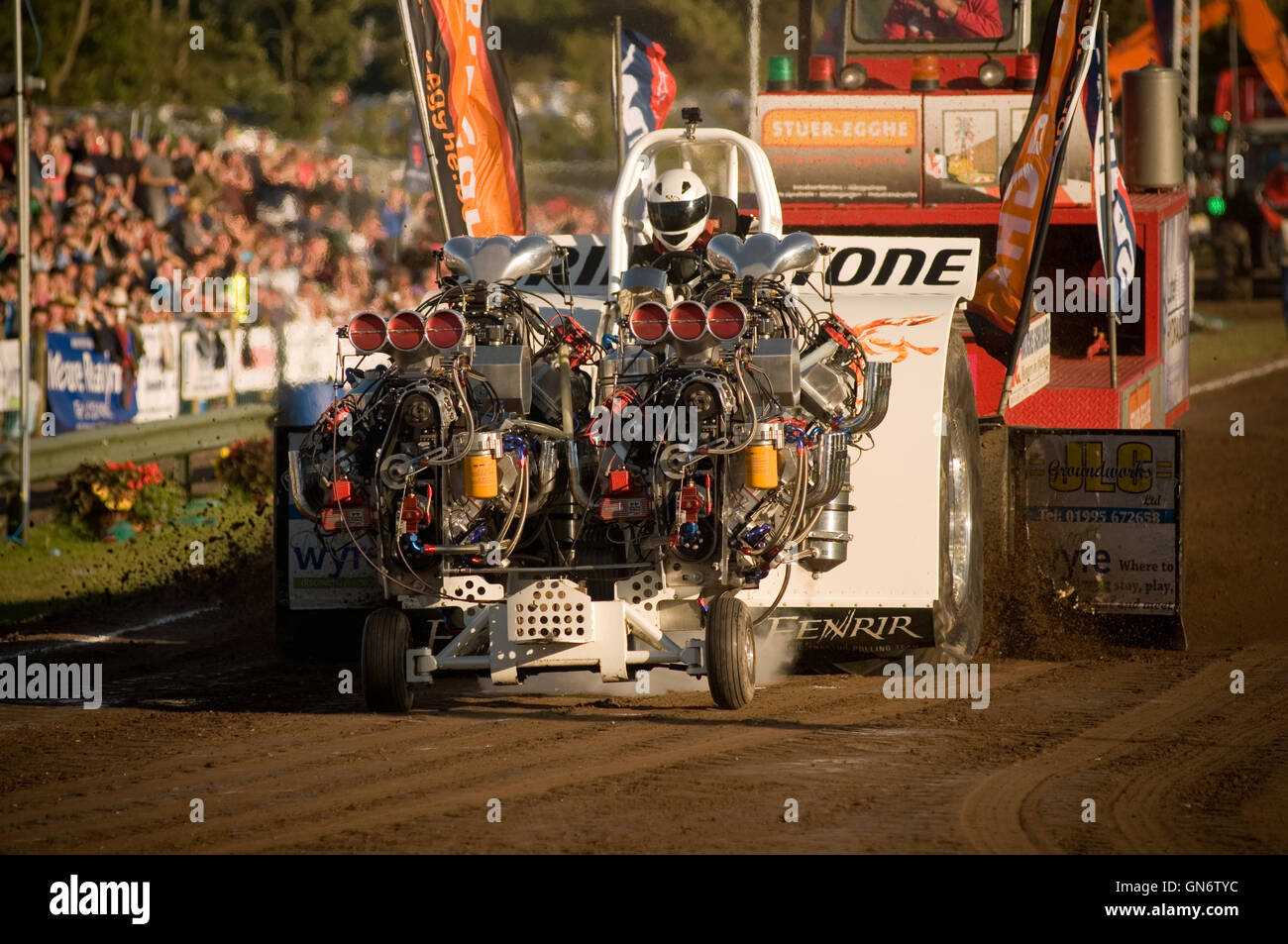 danish tractor pulling team competing with 4 V8 supercharged engines Stock Photo