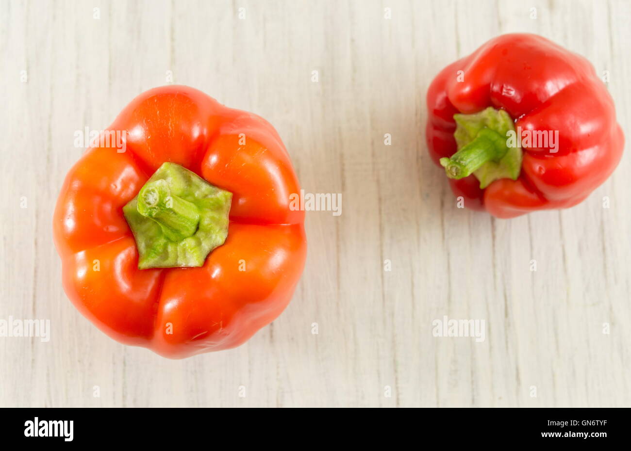 Raw red pepper vegetables on the table Stock Photo