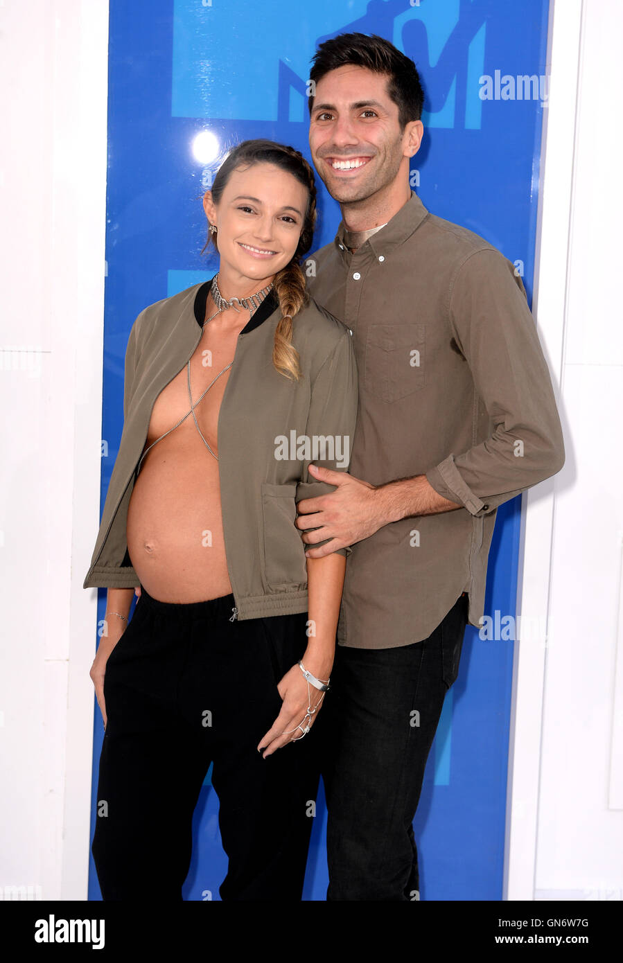 Nev Schulman and pregnant fiancee Laura Perlongo arriving at the MTV