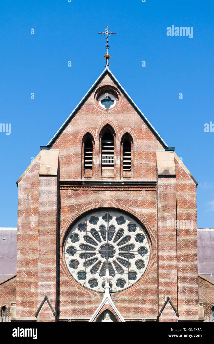 Top facade with rose window of Saint Laurentius Church in Alkmaar, North Holland, Netherlands Stock Photo