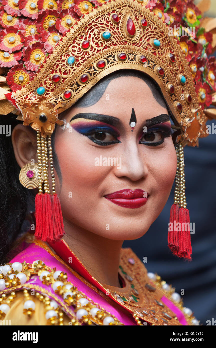 Denpasar, Bali Island, Indonesia - June 20, 2015: Face portrait of beautiful young Balinese woman dancer Stock Photo