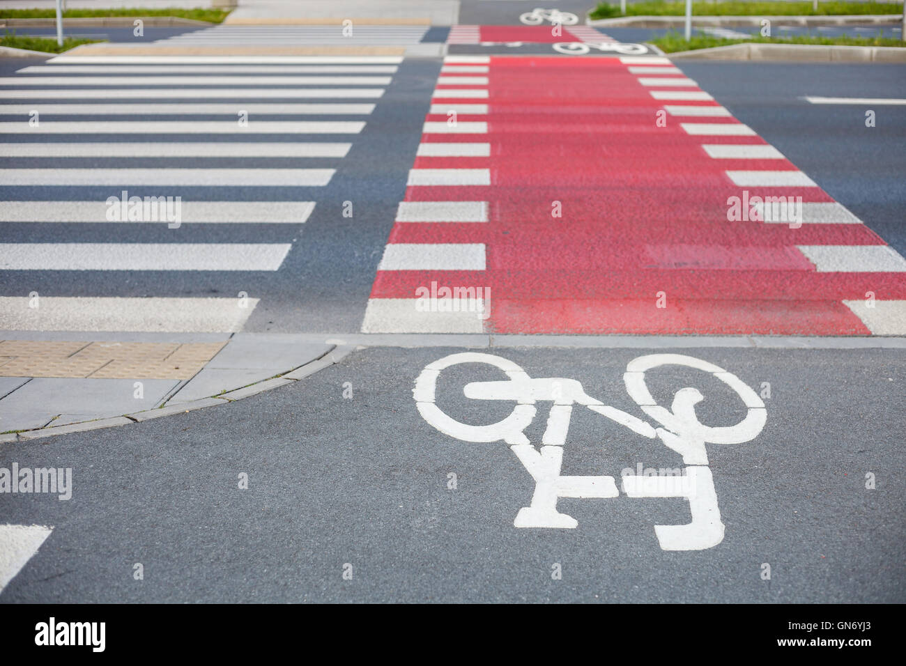 Bike path crossing road Stock Photo Alamy