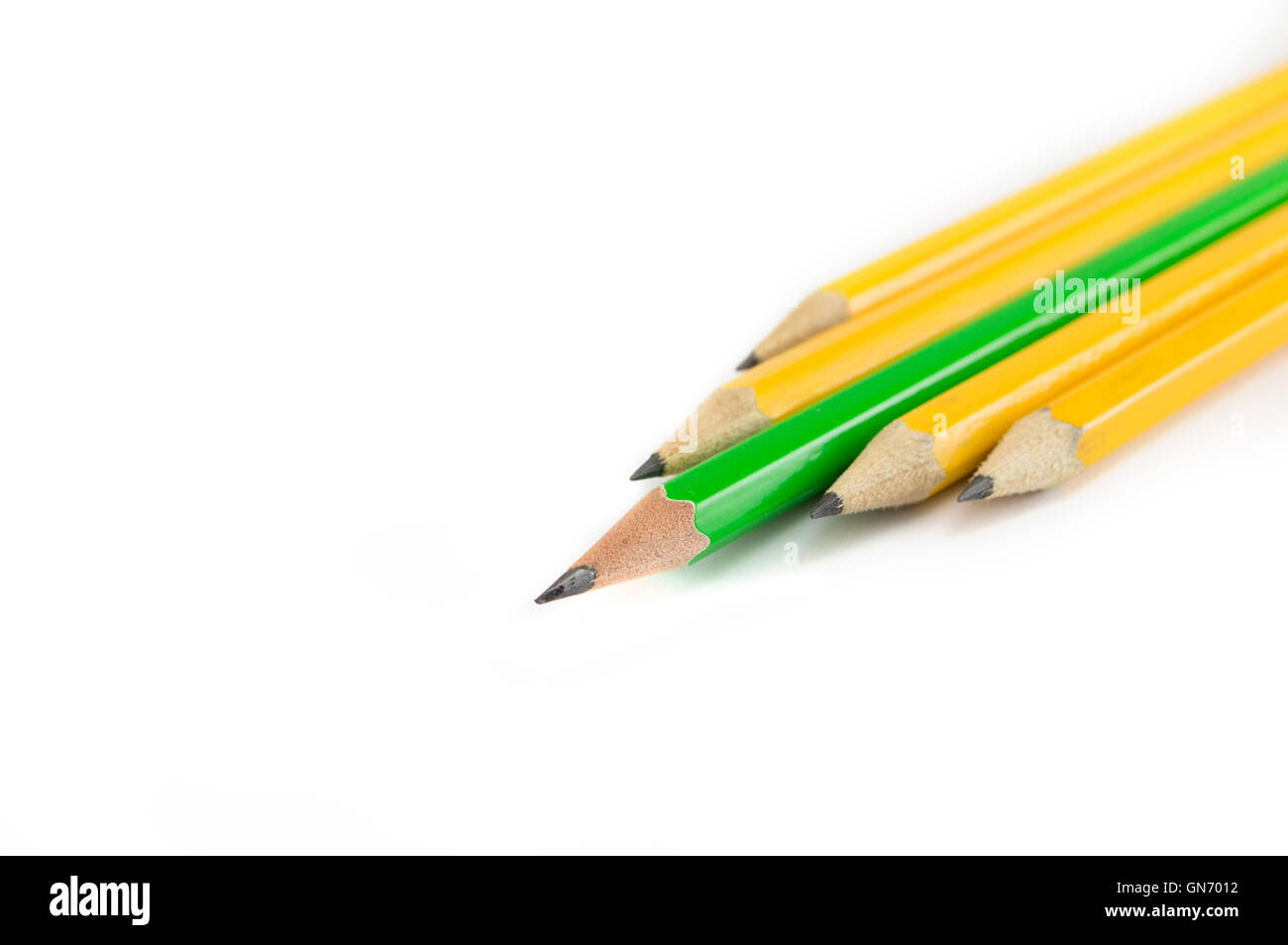 Five pencils in a group on white background Stock Photo