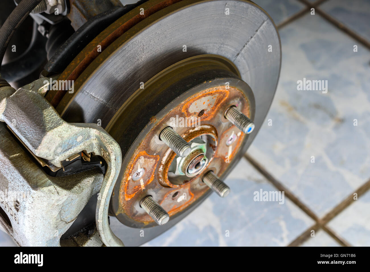 close up and detail rusty brake disk of the wheel Stock Photo