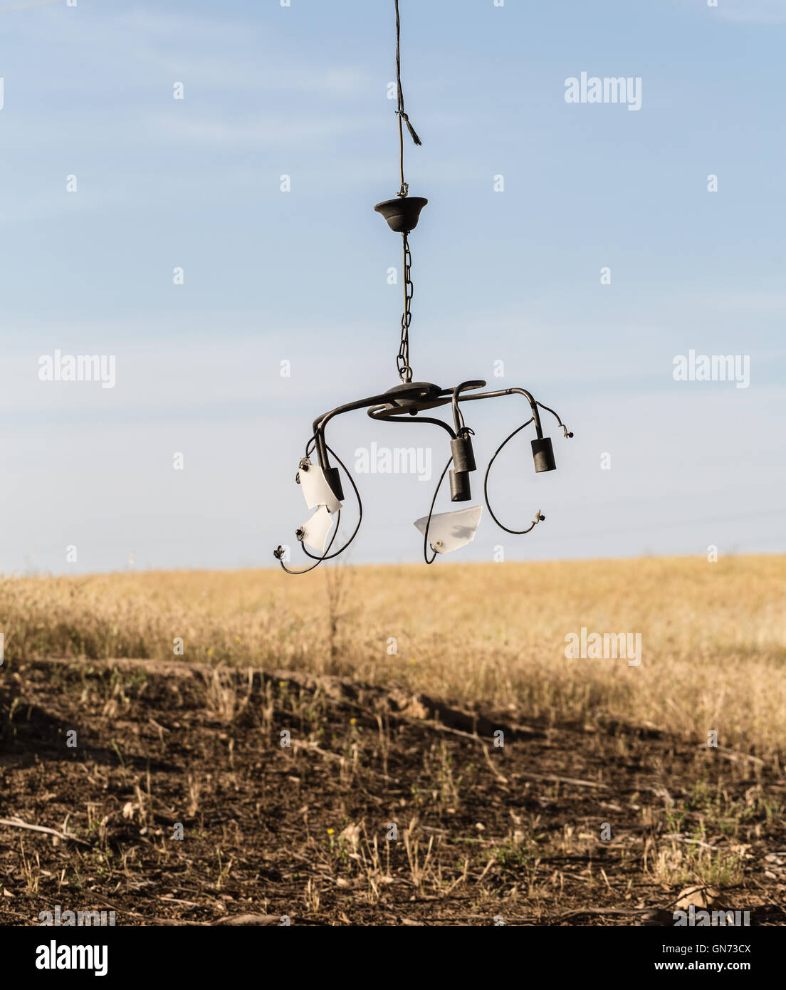 old the broken chandelier hanging on outdoors Stock Photo Alamy