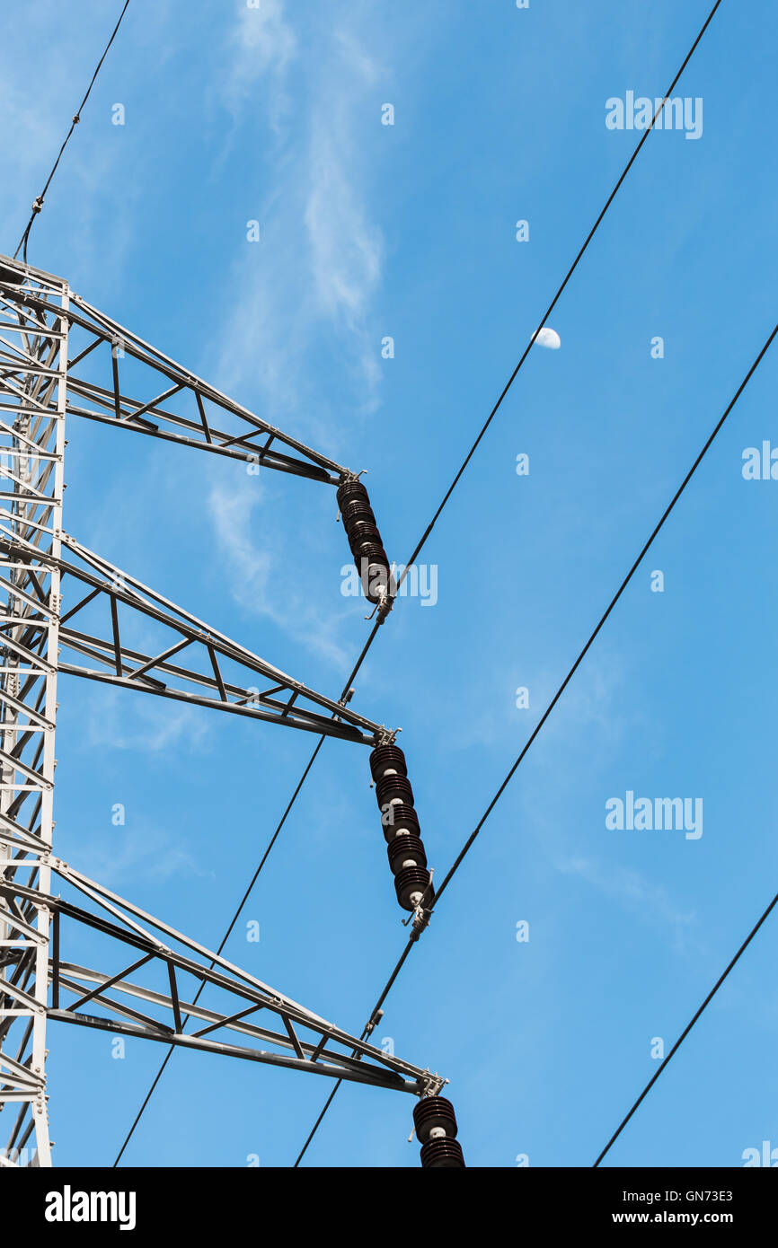 power poles with wires on a background of blue sky Stock Photo - Alamy
