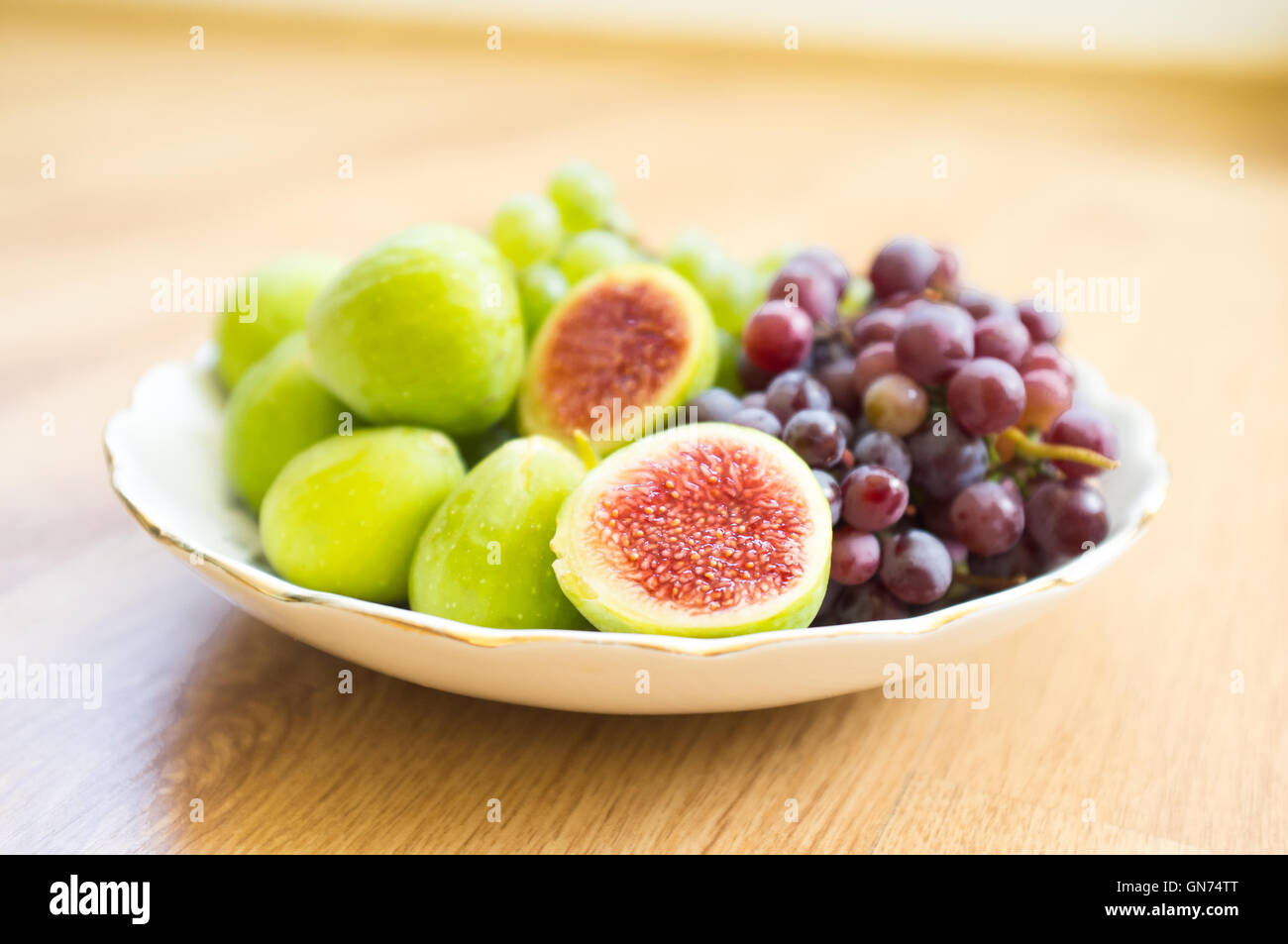 Fresh figs and grape Stock Photo