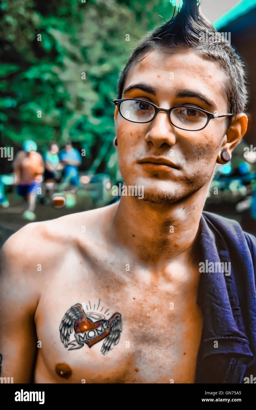 Young boy with tattoos Stock Photo Alamy