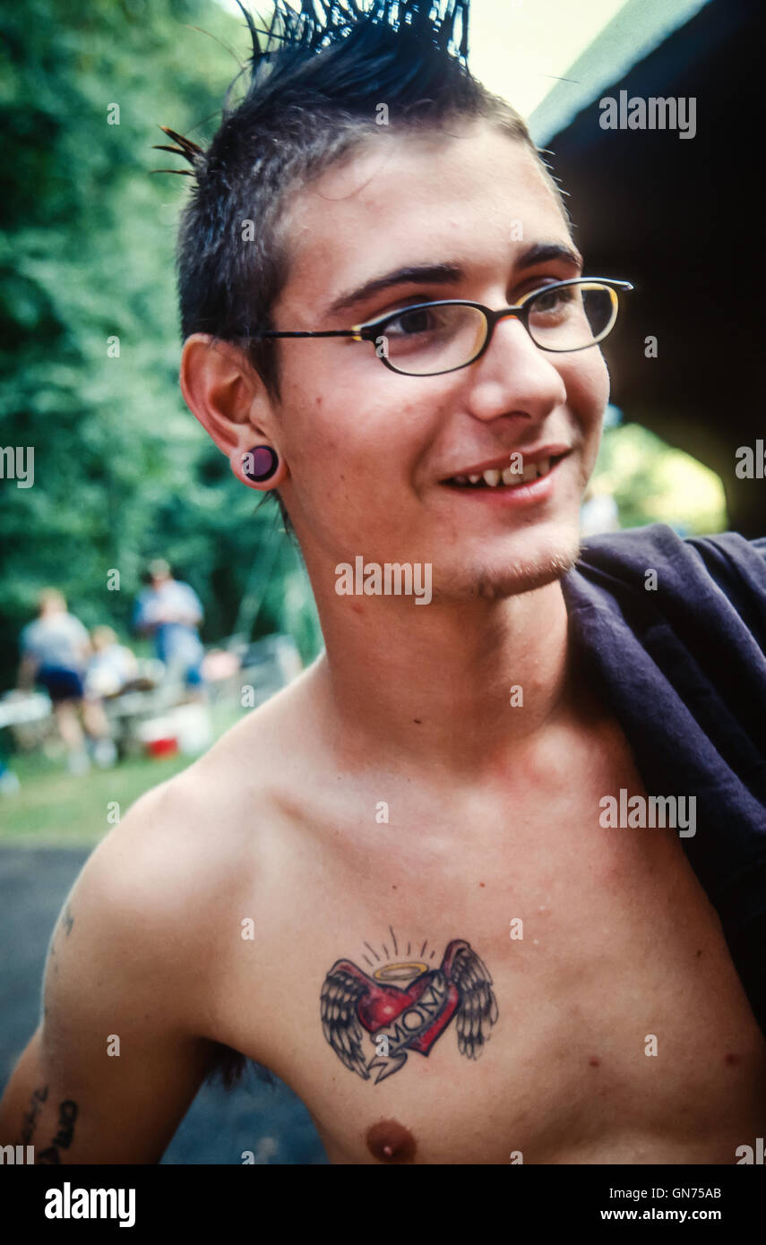 Young boy with tattoos. Stock Photo
