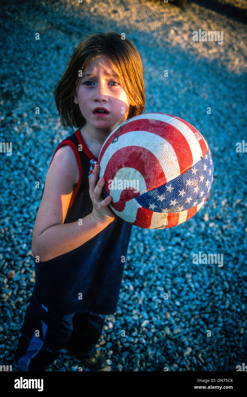 Children at play, having good time fun Young girl with colorful USA ...