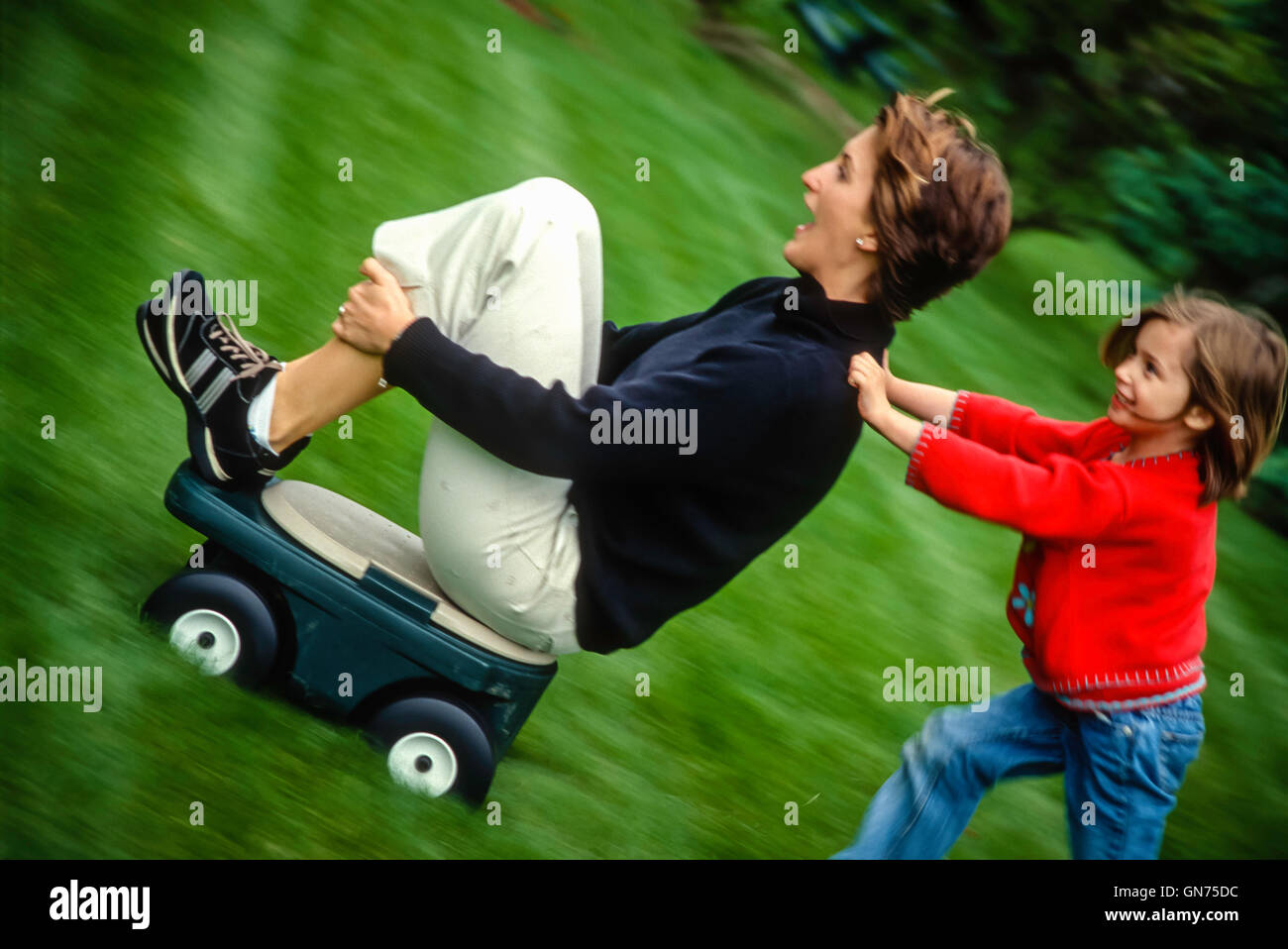 Racing wagon downhill Stock Photo Alamy