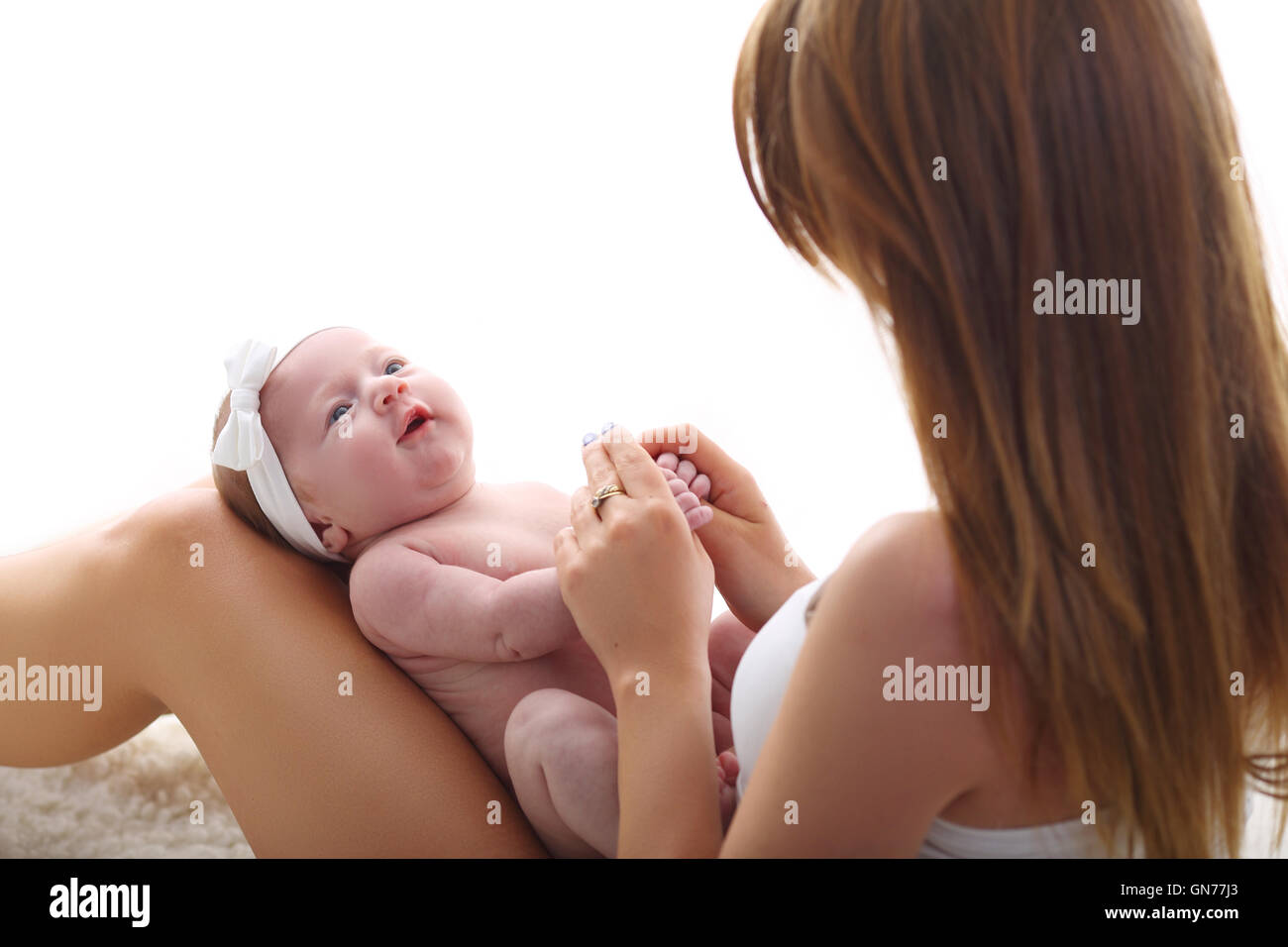 Mother with her infant baby Stock Photo