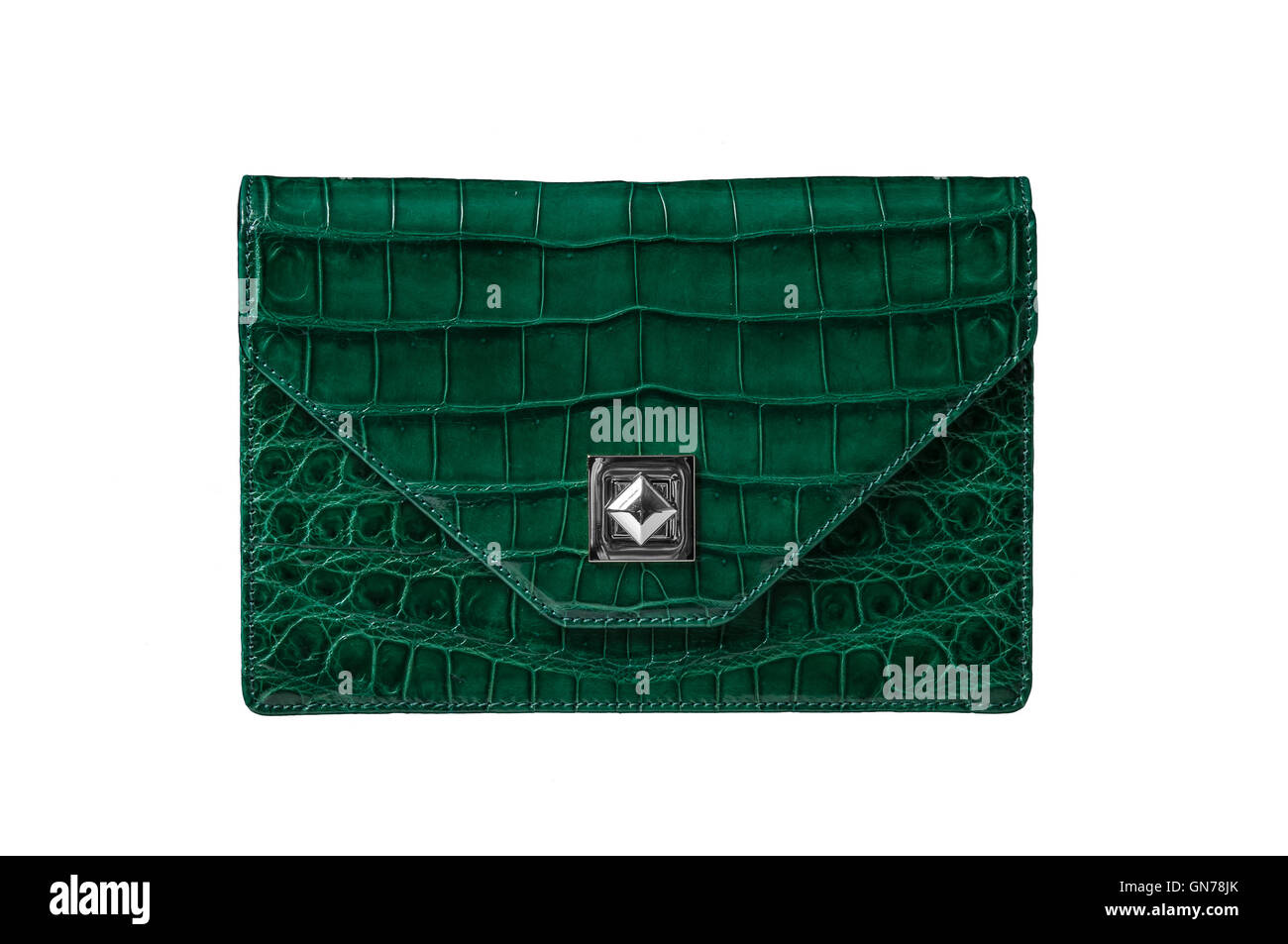 Handbag from alligator leather, hide in green color on white background no brand Stock Photo