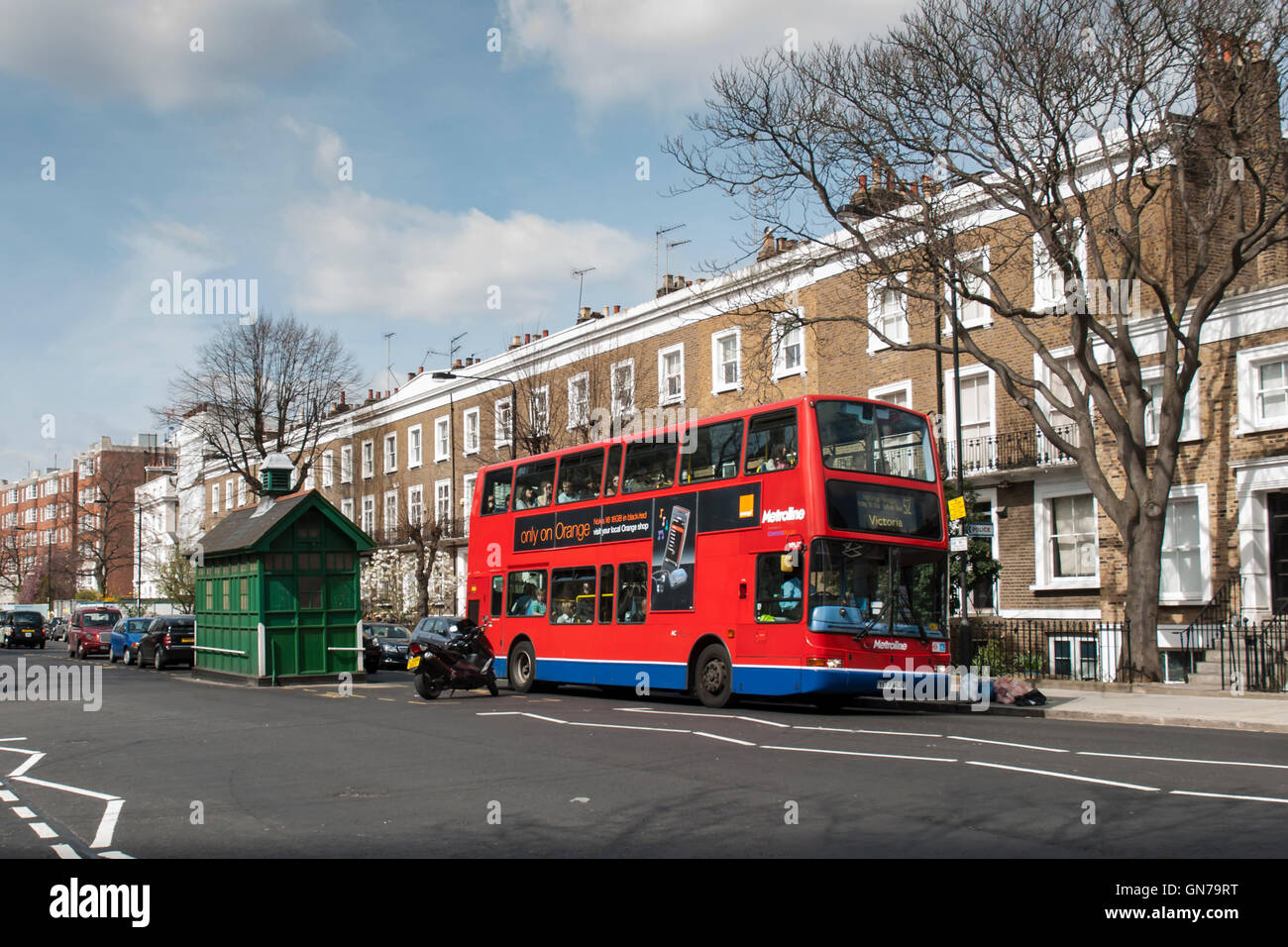 Double decker red bus, Royal Borough of Kensington and Chelsea, London, England, United Kingdom Stock Photo