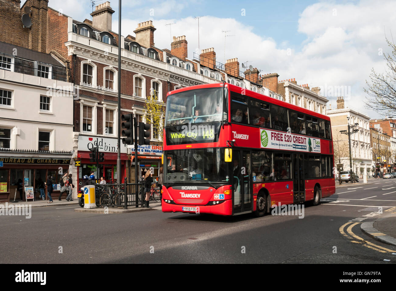 Double decker red bus, Royal Borough of Kensington and Chelsea, London, England, United Kingdom Stock Photo