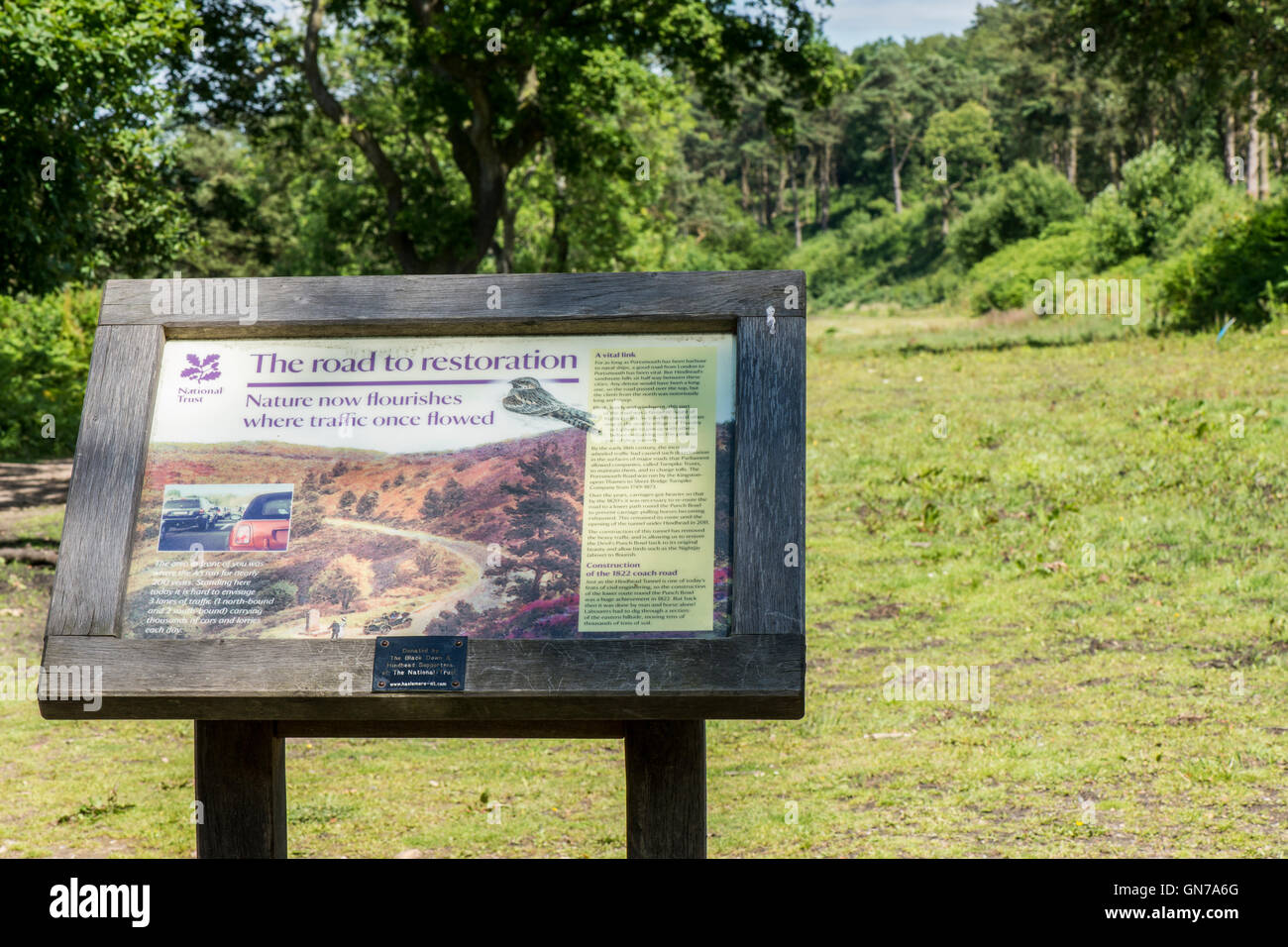 National Trust sign at the start of one of the many walks in and around the Devil's Punch Bowl, Near Hindhead, Surrey, England. Stock Photo