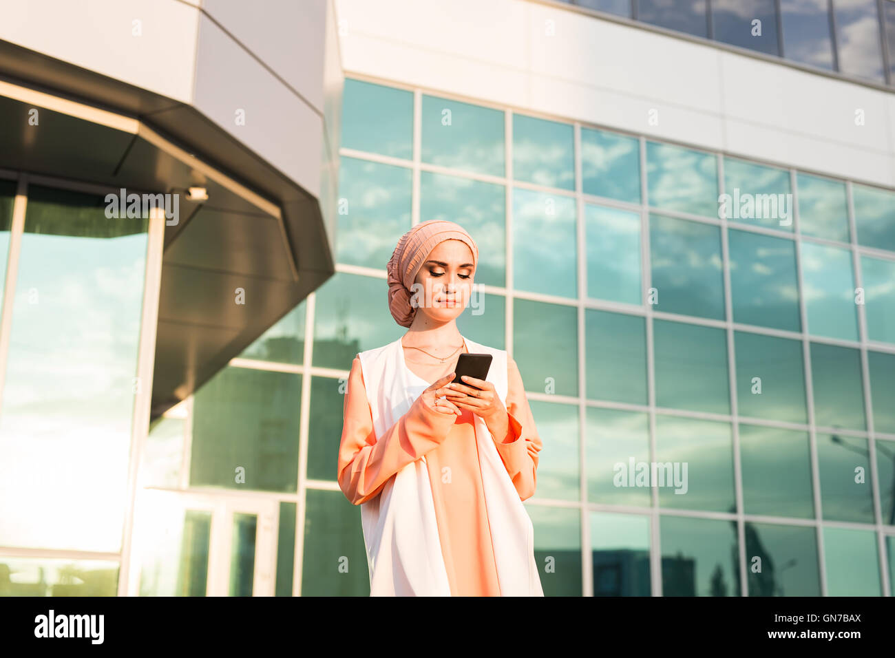 beautiful young arabian woman with cell phone Stock Photo - Alamy
