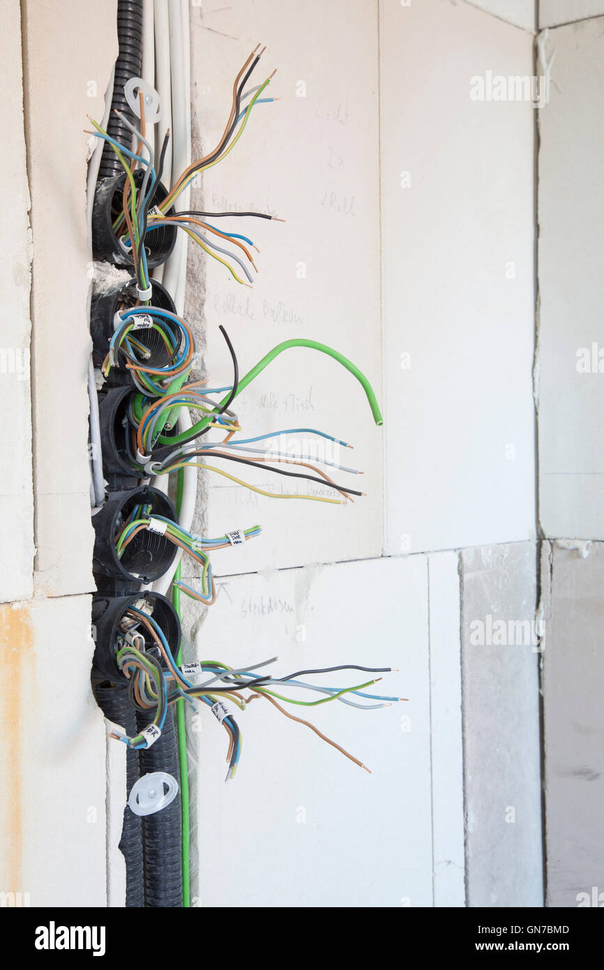 Cables and pipes in the wall Stock Photo - Alamy