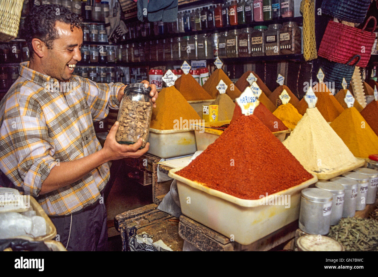 Essaouira, Morocco - Spice Vendor Sells Spices in the Suq Al-Ghazal (Al-Ghazal Market). Stock Photo