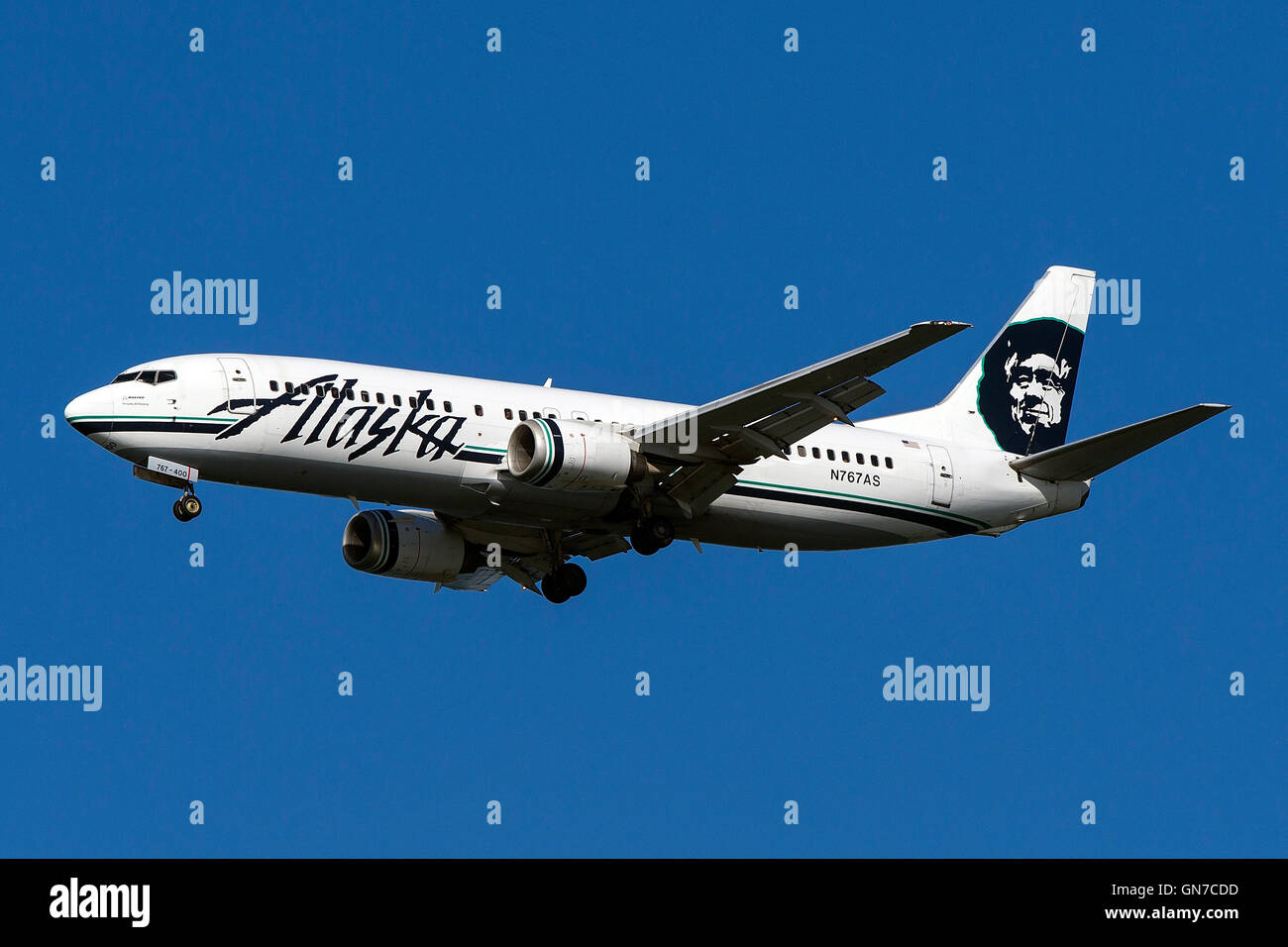 Alaska Airlines Boeing 737-490 (registration N767AS) approaches San Francisco International Airport (SFO) over San Mateo, California, United States of America Stock Photo