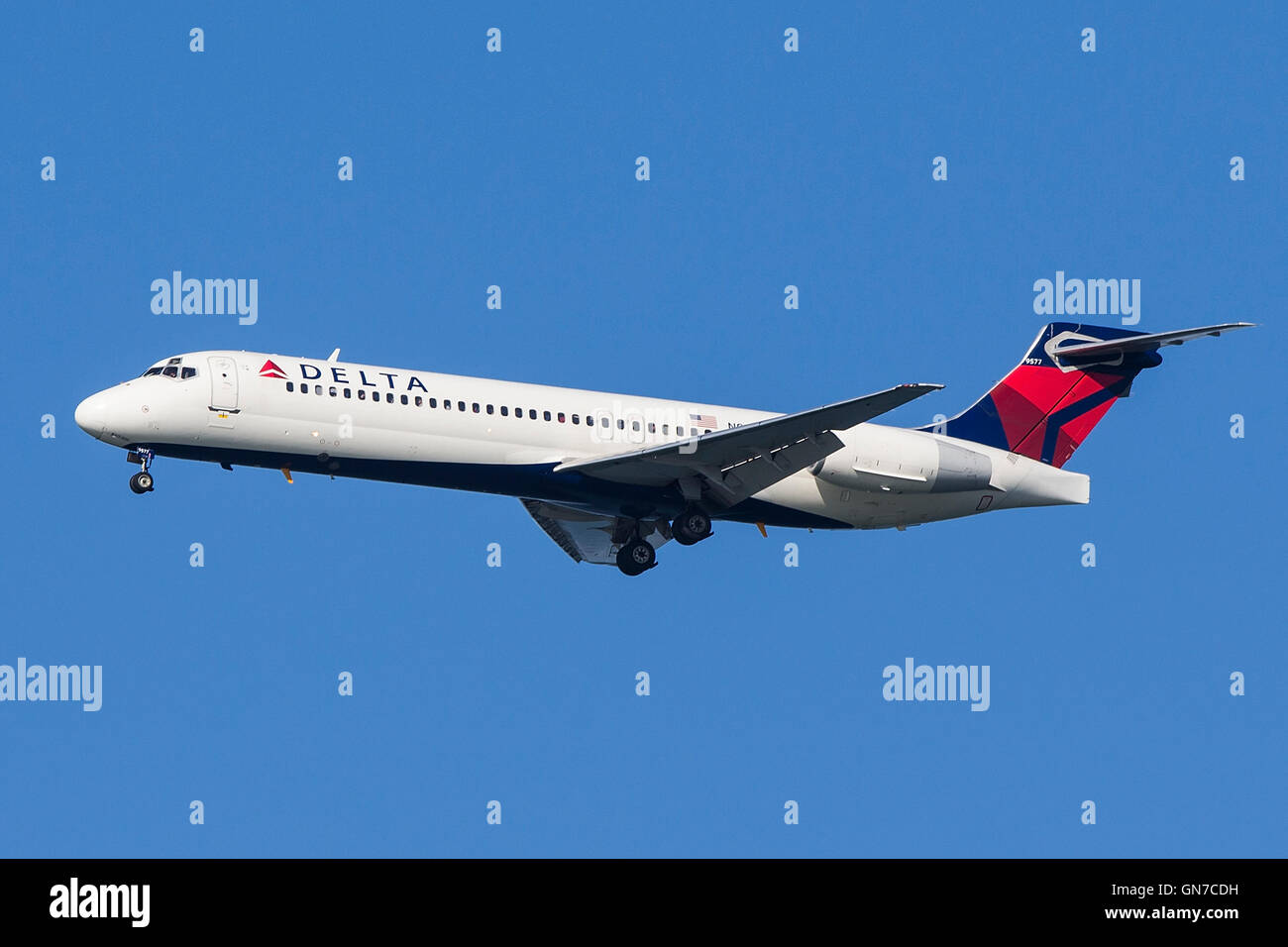 Delta Airlines Boeing 717-200 (registration N921AT) approaches San Francisco International Airport (SFO) over San Mateo, California, United States of America Stock Photo