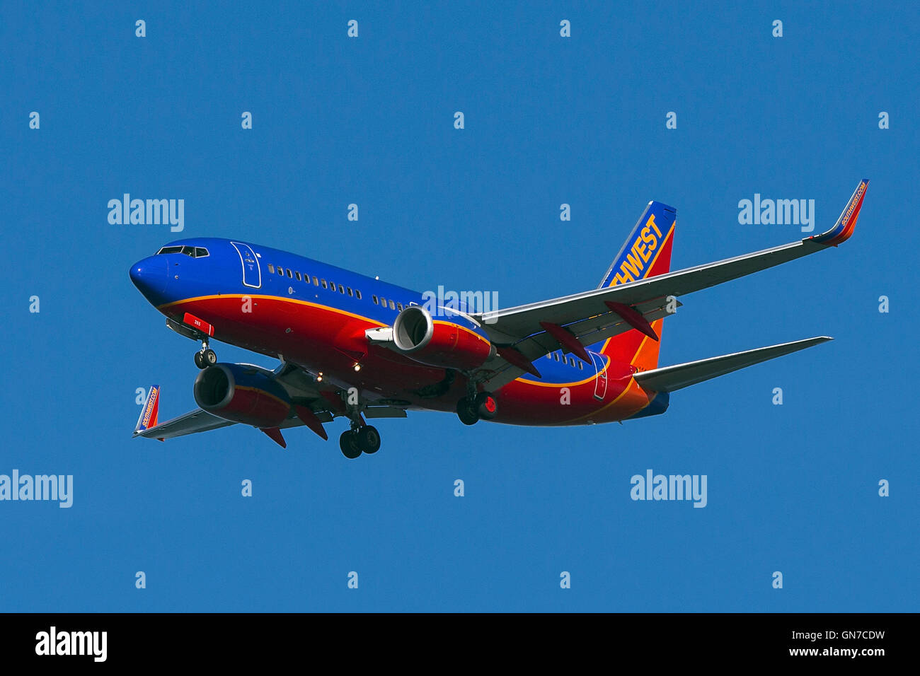 Southwest Airlines Boeing 737-7H4 (registration N265WN) approaches San Francisco International Airport (SFO) over San Mateo, California, United States of America Stock Photo