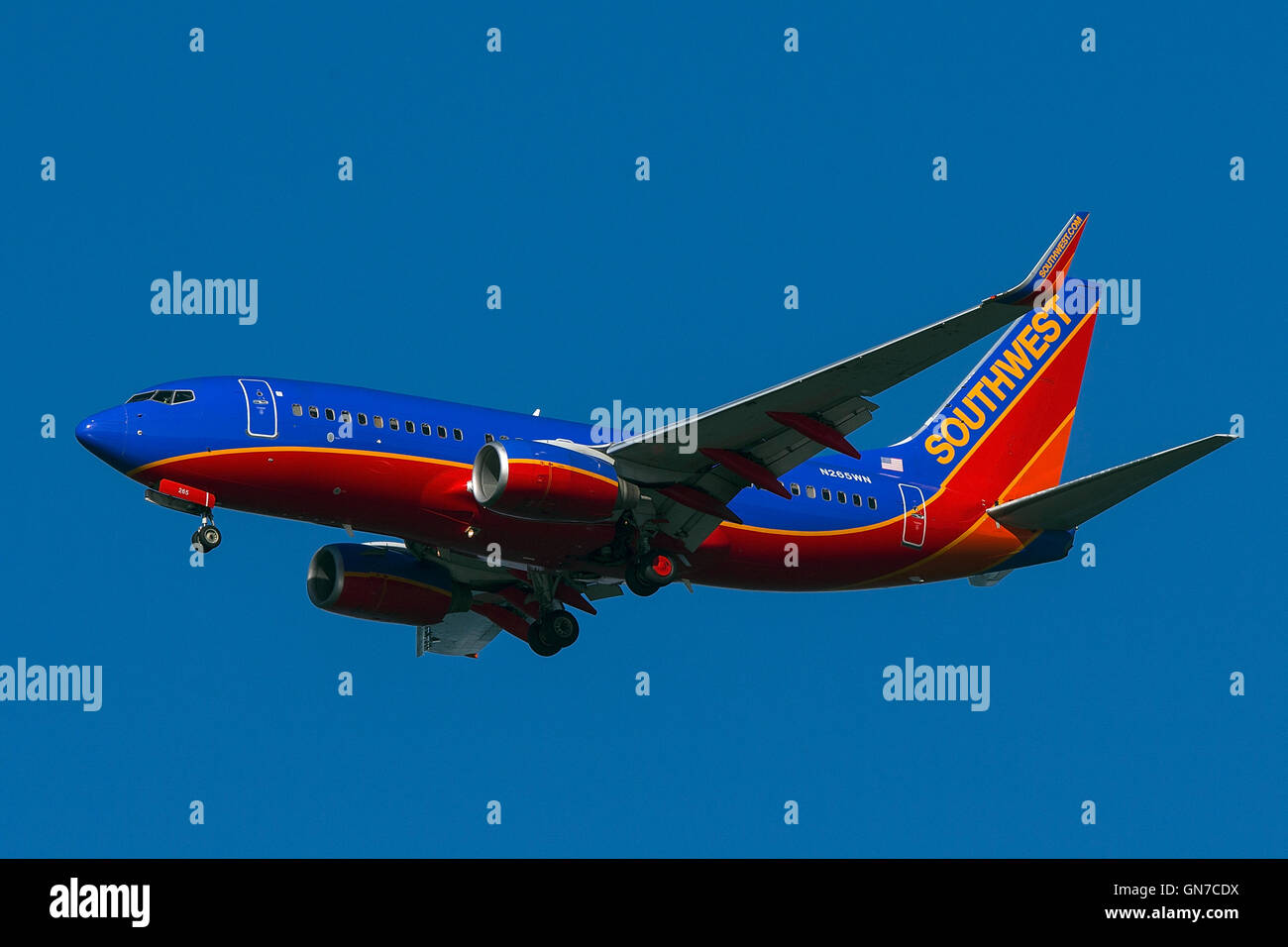 Southwest Airlines Boeing 737-7H4 (registration N265WN) approaches San Francisco International Airport (SFO) over San Mateo, California, United States of America Stock Photo