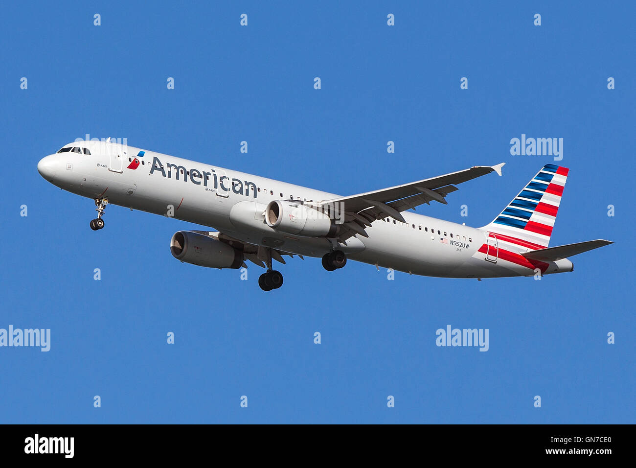 American Airlines Airbus A321-231 (registration N552UW) approaches San Francisco International Airport (SFO) over San Mateo, California, United States of America Stock Photo