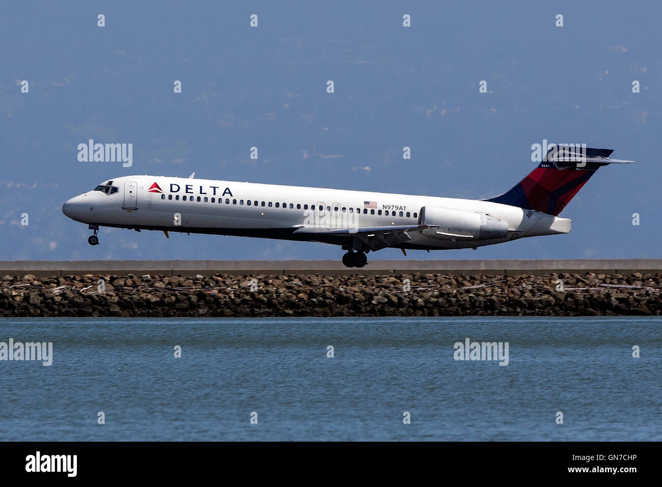 Delta Boeing 717-200 (N979AT) lands at San Francisco International Airport (SFO), Millbrae, California, United States of America Stock Photo